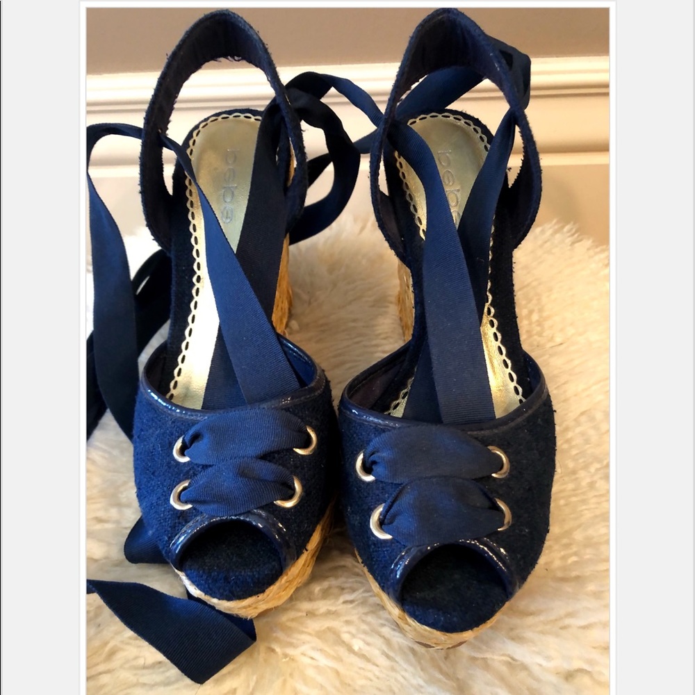 Peep toe wedges by Bebe